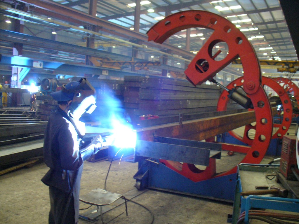 A welder in a Vietnamese factory under the ILO's Factory Improvement Programme. Photo by International Labor Organization, 12 January 2008. Licensed under CC BY-NC-ND 2.0 Generic